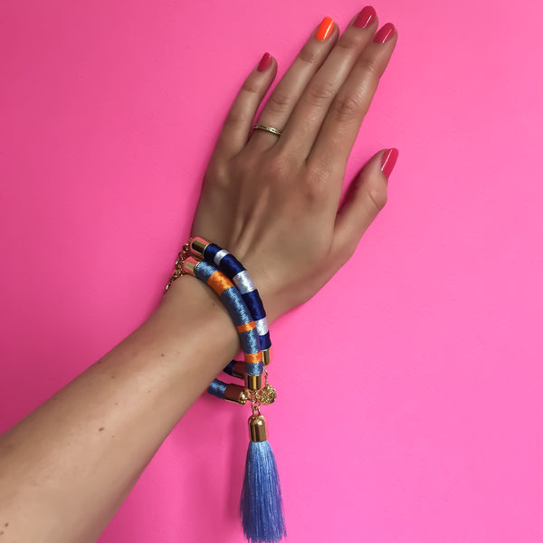 Light blue and orange hand-woven silk satin bracelet with a tassel | KRISTINAGOESWEST.COM - 5