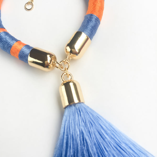 Light blue and orange hand-woven silk satin bracelet with a tassel | KRISTINAGOESWEST.COM - 2